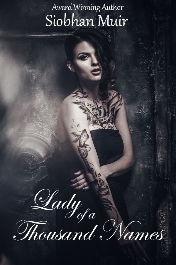 Tattooed beautiful woman in old spooky interior