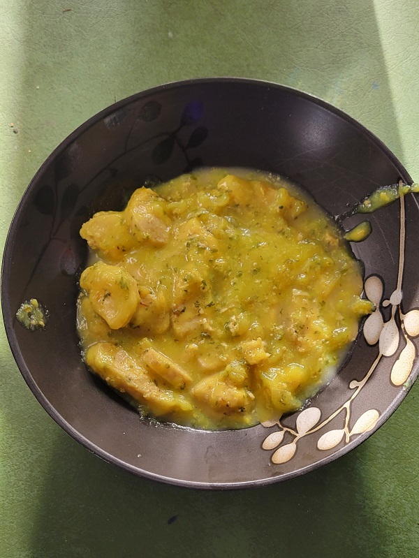 Scratch Chicken in a black bowl